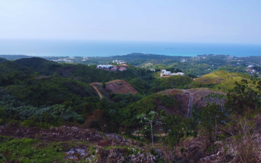 Great ocean view lot in authentic self-sufficient community
