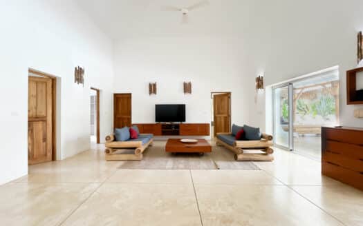 Magnifique maison de style caribéen dans une communauté en bord de mer