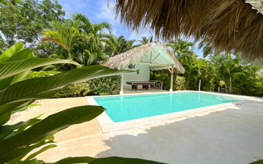 Magnifique maison de style caribéen dans une communauté en bord de mer