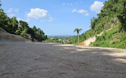 Terrain avec vue sur l’océan dans une communauté sécurisée