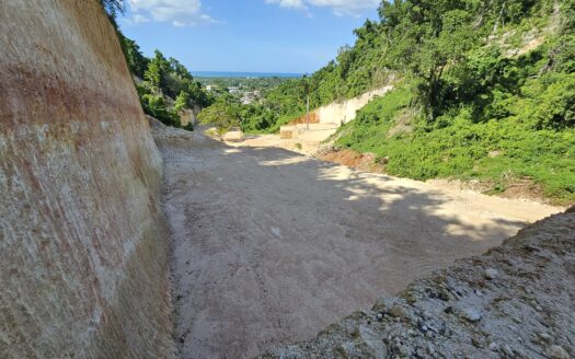 Terrain avec vue sur l’océan dans une communauté sécurisée